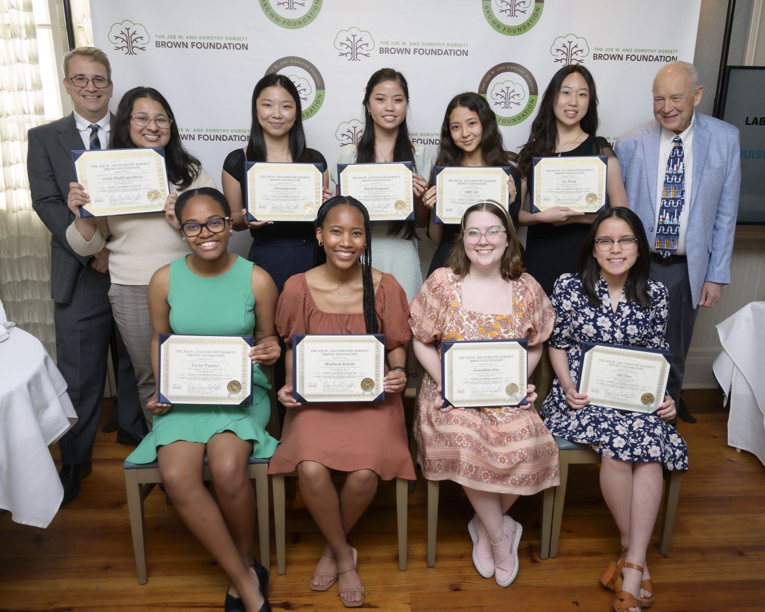 2023 Emmy Noether Scholars pictured with Professor Hunter and Ed Hunter from L to R:  (seated) Taylor Vander, Madison Echols, Josephine Day, Nhi Dao ; (standing)  Orna Mukhopadhyay, Christina You, Nateli Ferguson, Amy Liu, Joy Dong